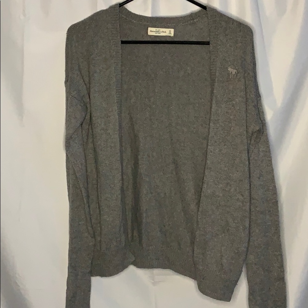 Grey throw over Sweater